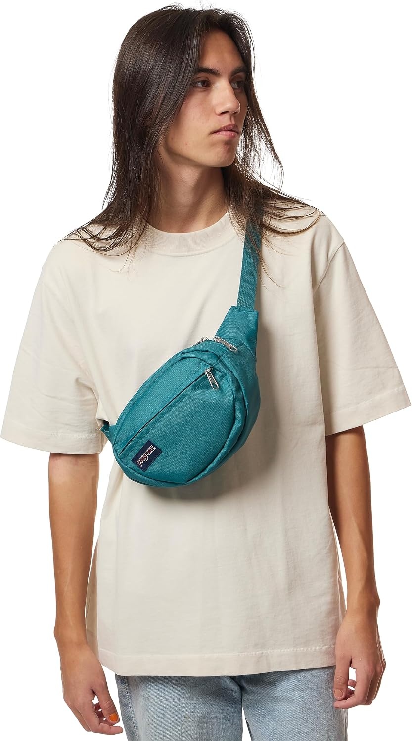 image:imageJanSport Fifth Avenue Fanny Pack Crossbody Bags for Women Men Stylish Durable Waist Bag with Adjustable Belt Main Zippered Pocket Quick Stash Pocket Travel Essentials Lavender AshEmerald Pool