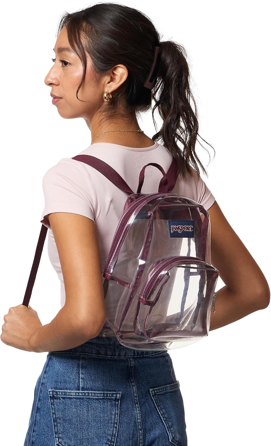 image:imageJanSport 10L Mini Pack Clear StadiumConcert Bag Clear Compact amp Lightweight Festival Bag with Adjustable Straps amp Zippered PocketCherry Lacquer