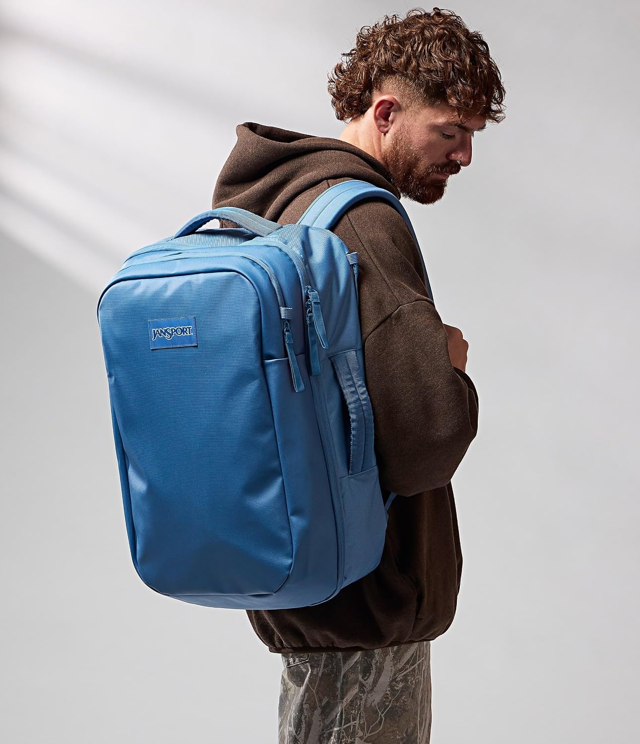 image:imageJanSport Good Latitude Travel Pack 40L Large Carry On Backpack AntiTheft Zippers amp 16 Inch Laptop Sleeve Weekender Bag for Travel Smokey GritElemental Blue