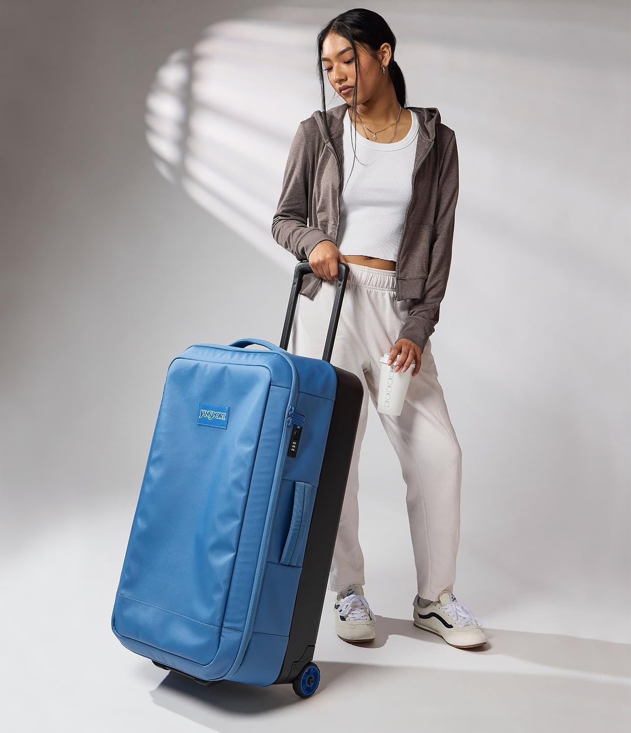 image:imageJansport Good Latitude 95L Rolling Duffel Bag Checked Bag Heavy Duty Travel Suitcase with Wheels TSA Lock amp Polycarbonate Hard Shell Bottom Elemental BlueElemental Blue