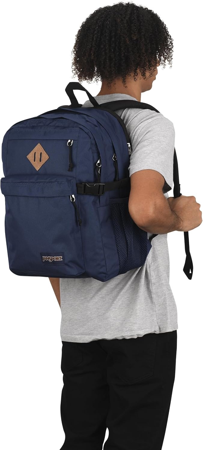 image:imageJanSport Main Campus Backpack Travel or Work backpack w 15Inch Laptop Sleeve and Dual Water Bottle Pockets Rows Of Bows NaturalLemon IceNavy
