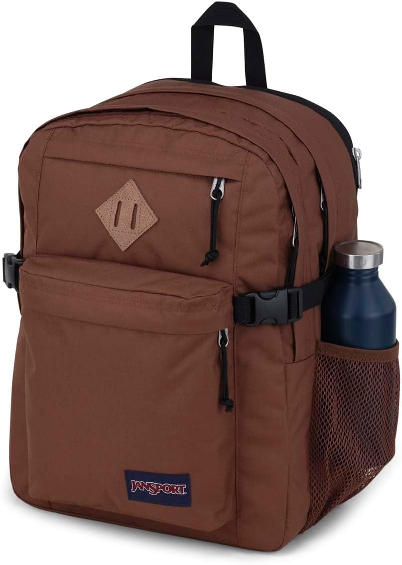 image:imageJanSport Main Campus Backpack Travel or Work Backpack with 15Inch Laptop Sleeve and Dual Water Bottle Pockets Lavender AshBasic Brown